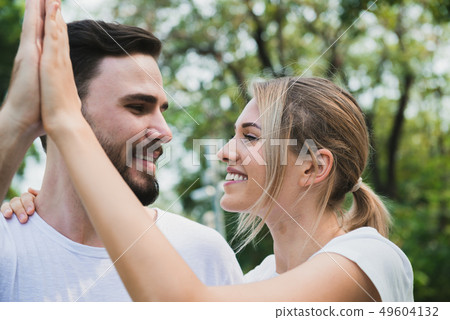 A couple happy and romancing at the park 49604132