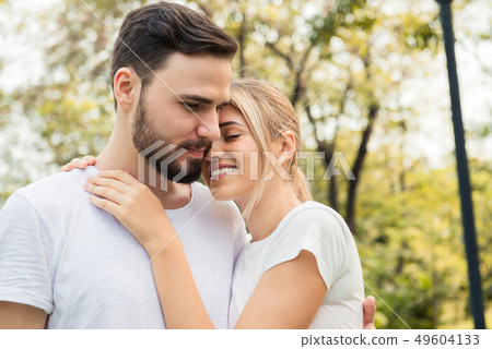 A couple happy and romancing at the park 49604133