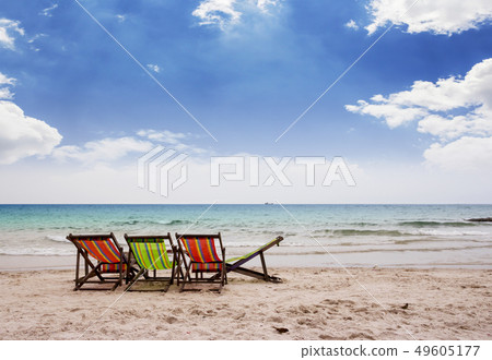 Beach chairs on beautiful tropical beach 49605177