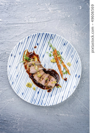 Sliced fried pork tenderloin with vegetable Sliced fried pork tenderloin with vegetable 49606569