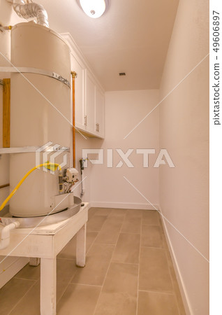Water heater and laundary room in a home 49606897