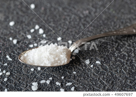 Spoon of sea salt Spoon of sea salt 49607697