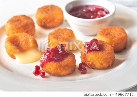 Camembert nuggets with cranberry sauce 49607715