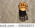 Silhouette from a thicket with coffee on a stone surface 49608855