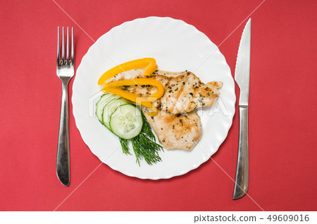 grilled chicken fillet on white plate grilled chicken fillet on white plate 49609016