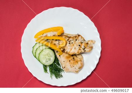 grilled chicken fillet on white plate grilled chicken fillet on white plate 49609017