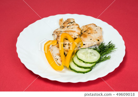grilled chicken fillet on white plate grilled chicken fillet on white plate 49609018