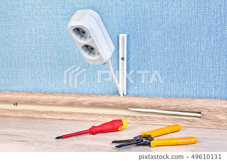 Installing of duplex receptacle outlet. Installing of duplex receptacle outlet. 49610131