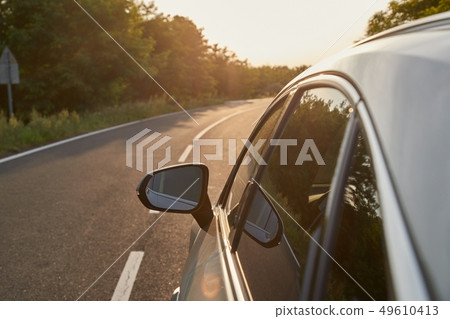 Car on the road 49610413