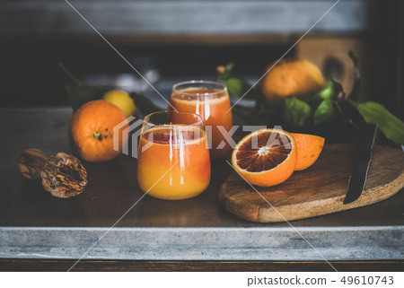 Glasses of freshly squeezed blood orange juice or Glasses of freshly squeezed blood orange juice or 49610743