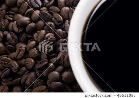Coffe beans and cup Coffe beans and cup 49611085