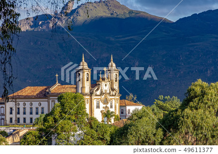 Ancient historical catholic church and hill in Ancient historical catholic church and hill in 49611377