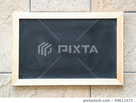 Blank used blackboard on tiles Blank used blackboard on tiles 49611473