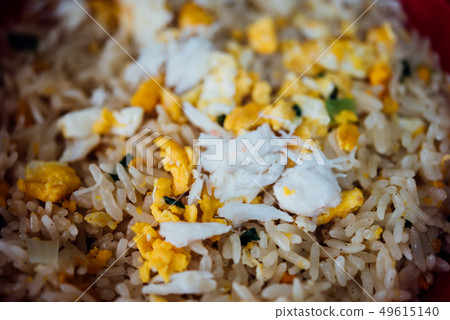 Crab meat fried rice at Thai street food market Crab meat fried rice at Thai street food market 49615140