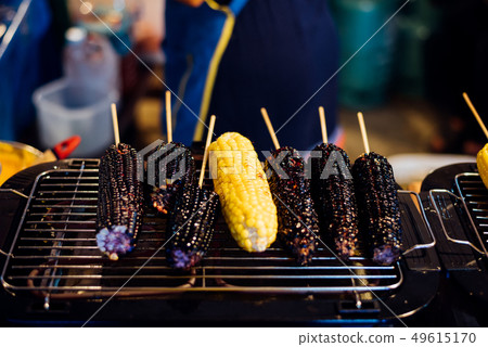 Grilled Corn and Purple Corn at Thai street food Grilled Corn and Purple Corn at Thai street food 49615170