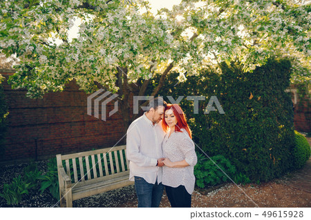 elegant family in a park 49615928