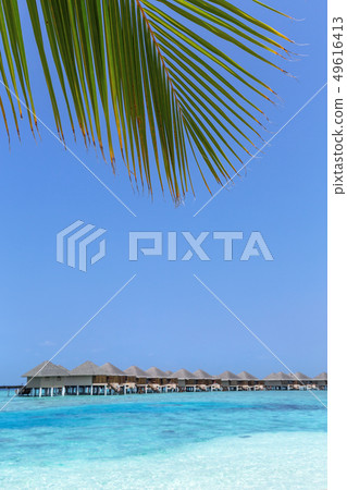 beach with water bungalows at maldivian island beach with water bungalows at maldivian island 49616413
