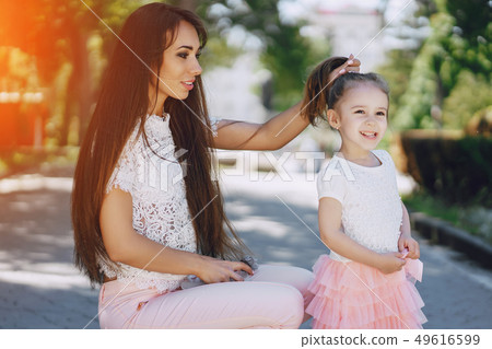 Mother with daughter Mother with daughter 49616599