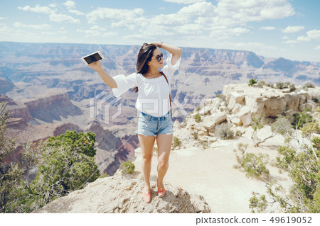 girl exploring the grand canyon in Arizona girl exploring the grand canyon in Arizona 49619052