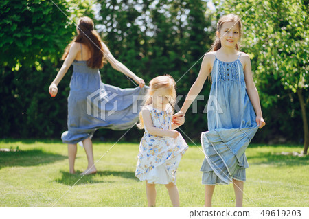 Mother with daughters 49619203