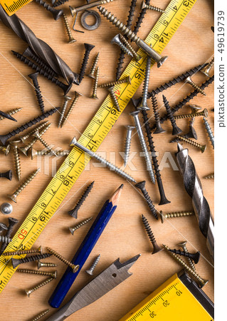 Construction theme. Working Tool on a Wooden Construction theme. Working Tool on a Wooden 49619739