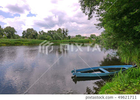 A fishing boat with a little water standing in a r 49621711