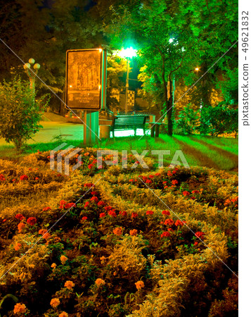 A chic designer flowerbed in a park with beautiful A chic designer flowerbed in a park with beautiful 49621832