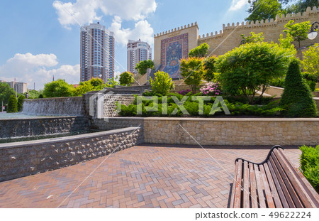 A mosaic wall with arabesque near the fountain in A mosaic wall with arabesque near the fountain in 49622224