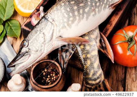 Fish pike on the kitchen board Fish pike on the kitchen board 49622937