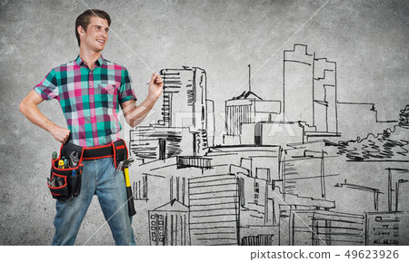 Guy engineer sketching his ideas 49623926
