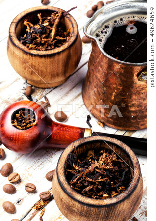Smoking pipe and coffee Smoking pipe and coffee 49624659