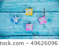 Gift Boxes on Blue Background 49626096