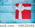 Gift Box on Blue Background 49626098