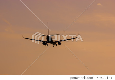 Passenger plane in the sky with the landing gear Passenger plane in the sky with the landing gear 49629124