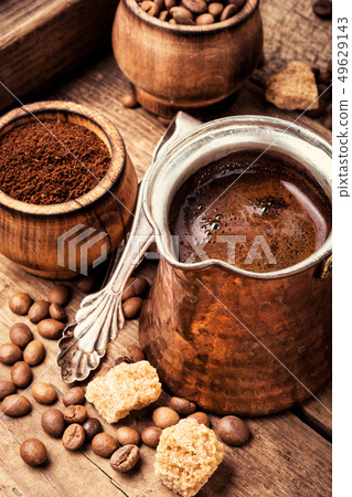 Coffee beans and grounds Coffee beans and grounds 49629143
