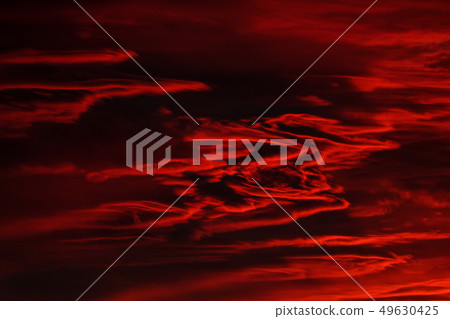 Dramatic fiery black and red storm sky 49630425