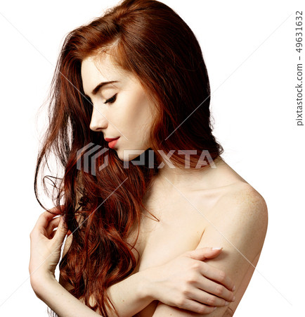 Beauty portrait of redhead woman with perfect skin. Beauty portrait of redhead woman with perfect skin. 49631632