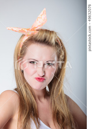 Pin up blonde fashion girl funny face 49632076