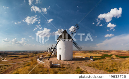 Windmills at sunset in Consuegra, Castile-La Mancha, Spain. 49632726