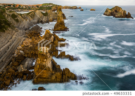 Dramatic view of Playa de la Arnia, Cantabria, Spain. Dramatic view of Playa de la Arnia, Cantabria, Spain. 49633331