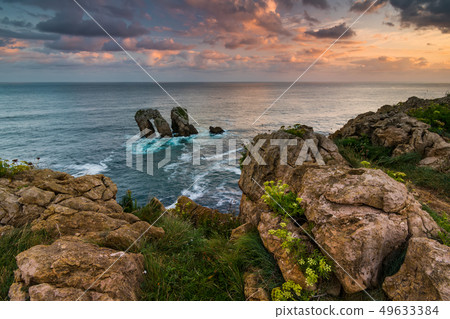 Dramatic view of Playa de la Arnia, Cantabria, Spain. 49633384