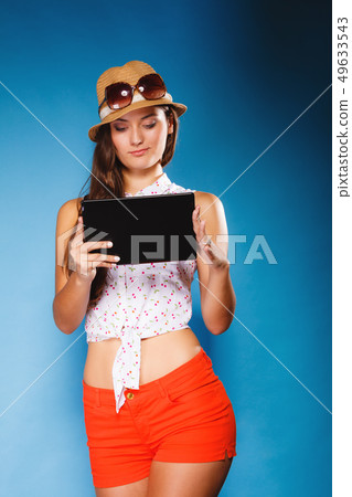 girl using tablet computer e-book reader. 49633543