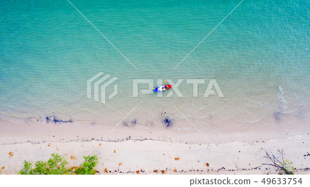 Aerial top view of kayaking around sea with shade 49633754