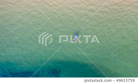 Aerial top view of kayaking around sea with shade Aerial top view of kayaking around sea with shade 49633759