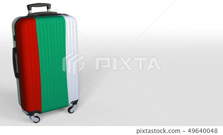 Traveler's suitcase with flag of Bulgaria. Bulgarian tourism conceptual 3D rendering, blank space 49640048