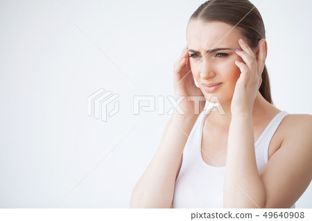 Woman In Pain Feeling Bad And Sick, Having Headache And Fever, Holding Hand On Forehead. Beautiful 49640908