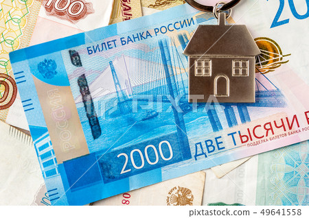 Keychain on the background of russian ruble banknotes Keychain on the background of russian ruble banknotes 49641558