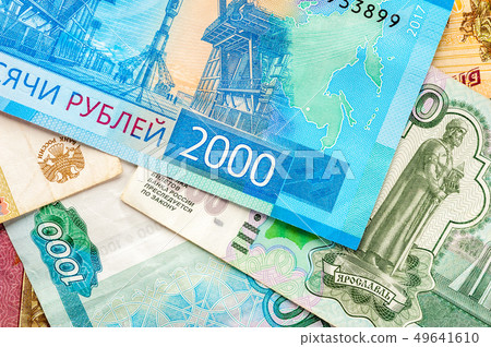 Different russian rubles background. Different russian rubles background. 49641610