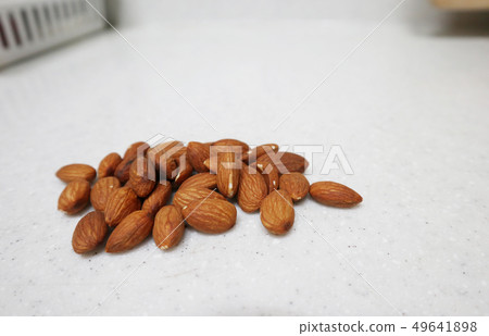 Scattered almonds 49641898
