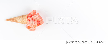 Coral lingerie in waffle cone on white background Coral lingerie in waffle cone on white background 49643228